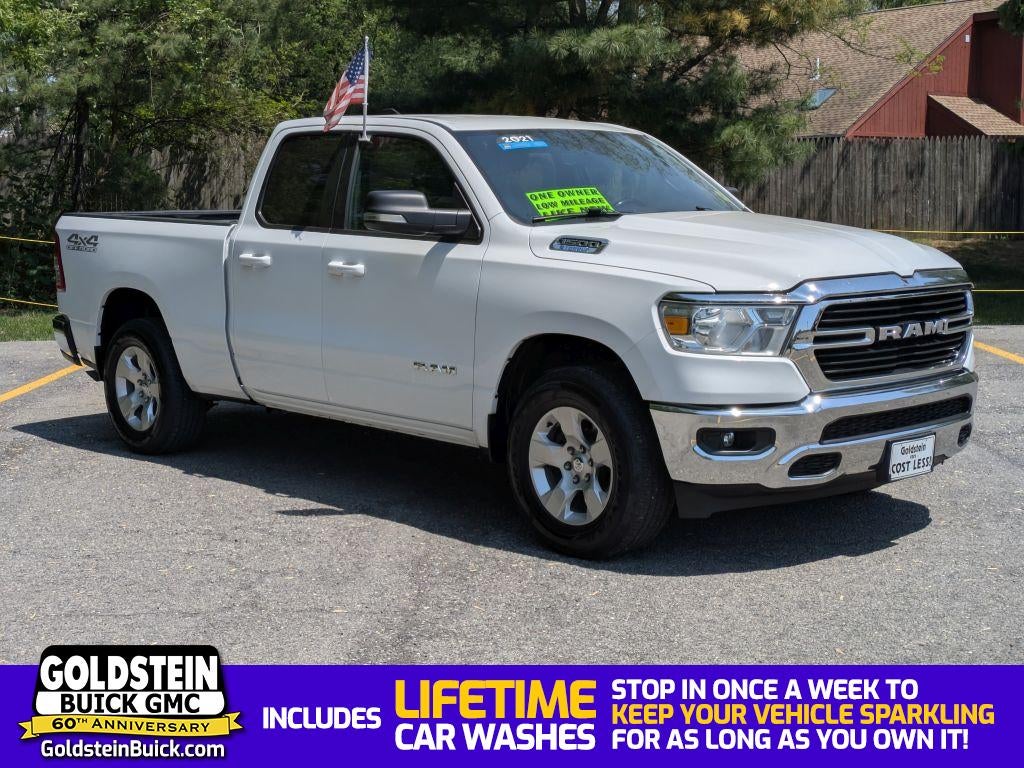 2021 RAM 1500 Big Horn Quad Cab 4x4 6'4" Box in White — front three-quarter view