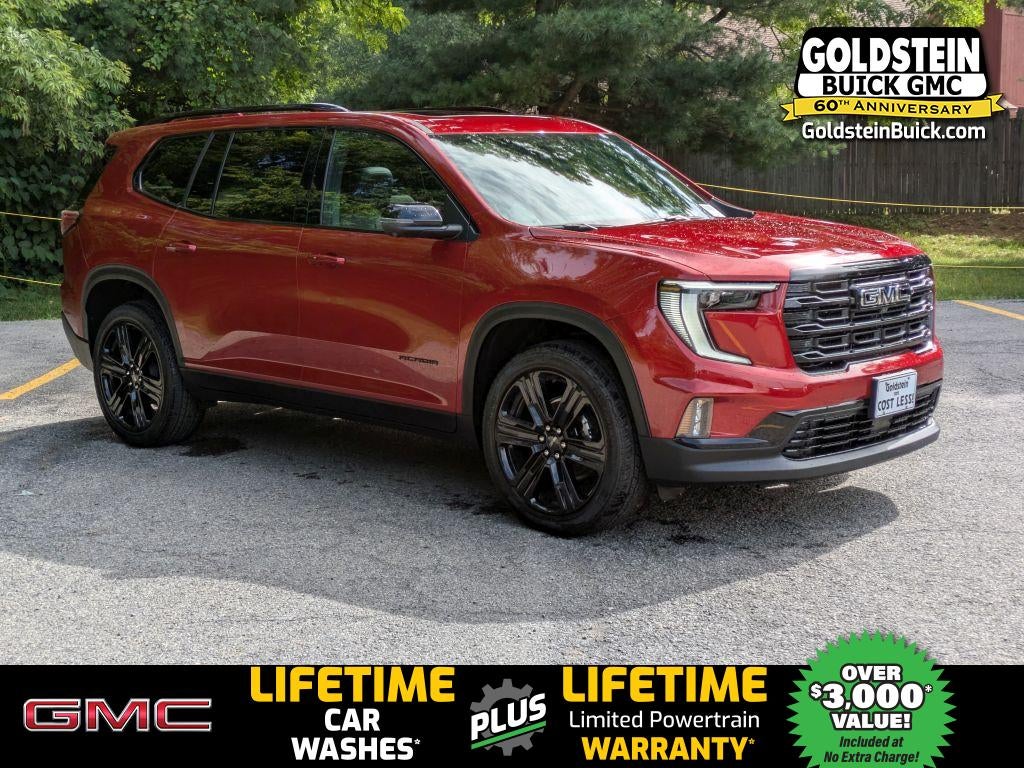 2026 GMC Acadia Elevation in Volcanic Red Tintcoat — front three-quarter view