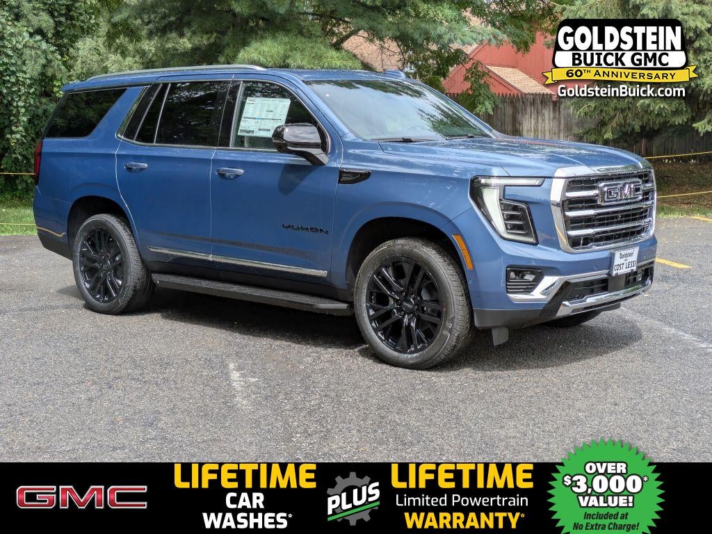 2026 GMC Yukon Elevation in Downpour Metallic — front three-quarter view