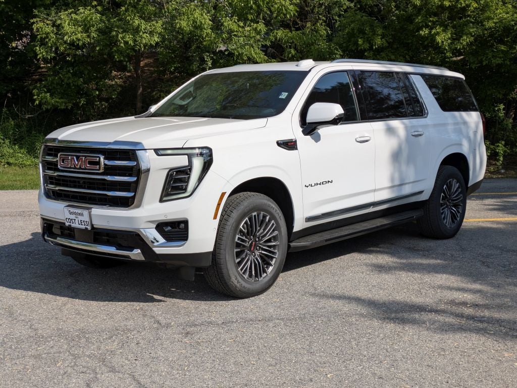 2026 GMC Yukon XL — rear three-quarter view