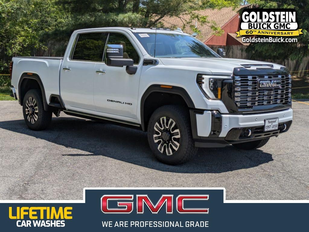 2026 GMC Sierra 3500 HD Denali Ultimate in Glacier White Tricoat — front three-quarter view