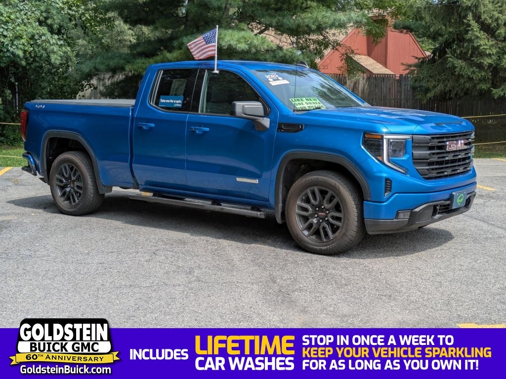 2023 GMC Sierra 1500 Elevation in Dynamic Blue Metallic — front three-quarter view