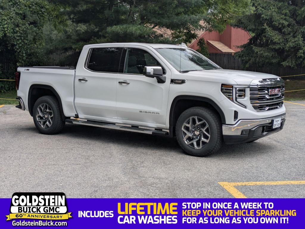 2026 GMC Sierra 1500 SLT in Summit White — front three-quarter view
