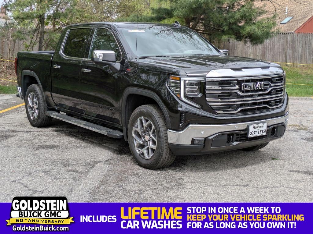 2026 GMC Sierra 1500 SLT in Onyx Black — front three-quarter view