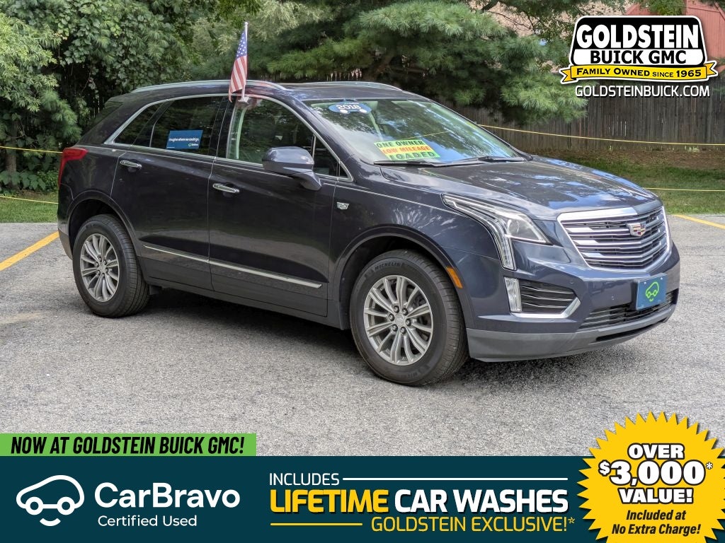 2018 Cadillac XT5 Luxury AWD in Harbor Blue Metallic — front three-quarter view