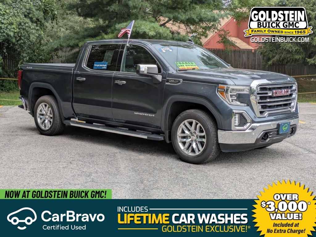 2019 GMC Sierra 1500 SLT in Dark Sky Metallic — front three-quarter view
