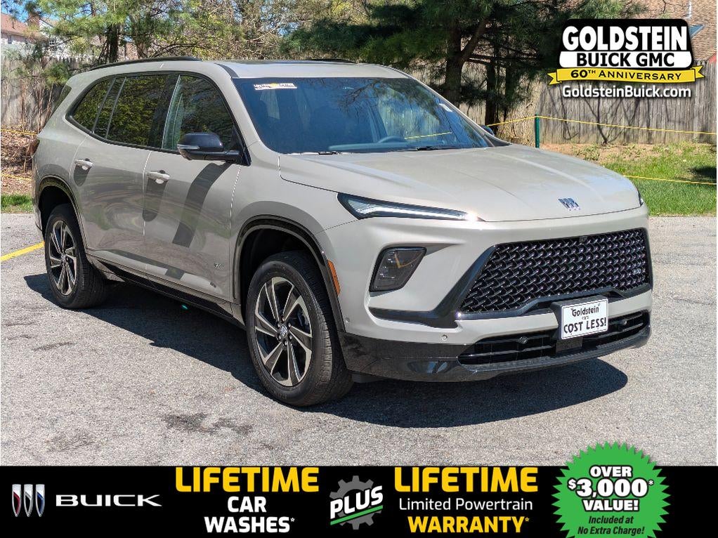 2026 Buick Enclave Sport Touring in Stone Metallic — front three-quarter view