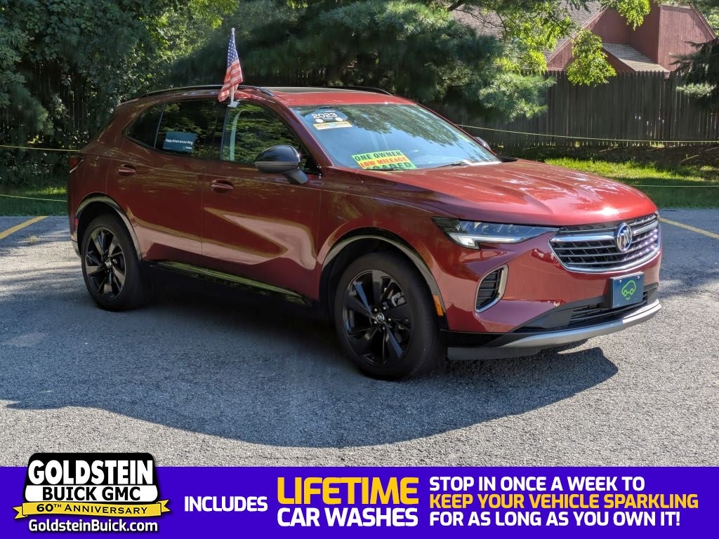 2023 Buick Envision Essence in Cinnabar Metallic — front three-quarter view