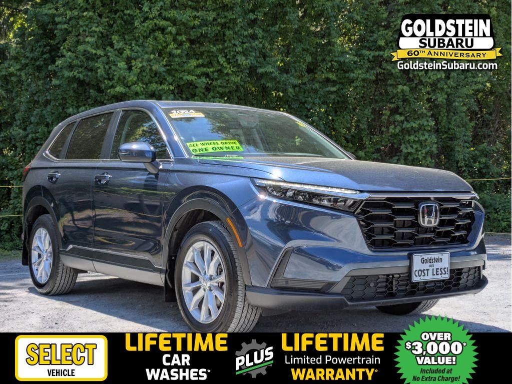 2024 Honda CR-V EX-L in Canyon River Blue Metallic — front three-quarter view