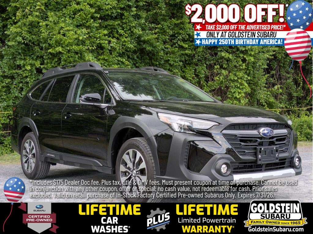 2025 Subaru Outback Limited in Crystal Black Silica — front three-quarter view