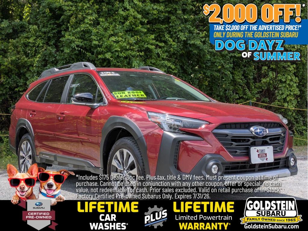 2025 Subaru Outback Limited in Crimson Red Pearl — front three-quarter view