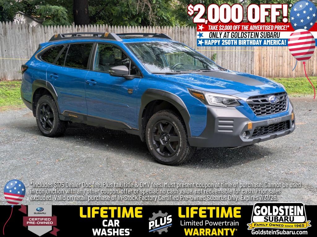 2023 Subaru Outback Wilderness in Geyser Blue — front three-quarter view