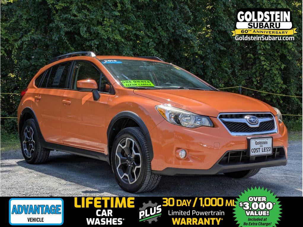 2015 Subaru XV Crosstrek Premium in Tangerine Orange Pearl — front three-quarter view